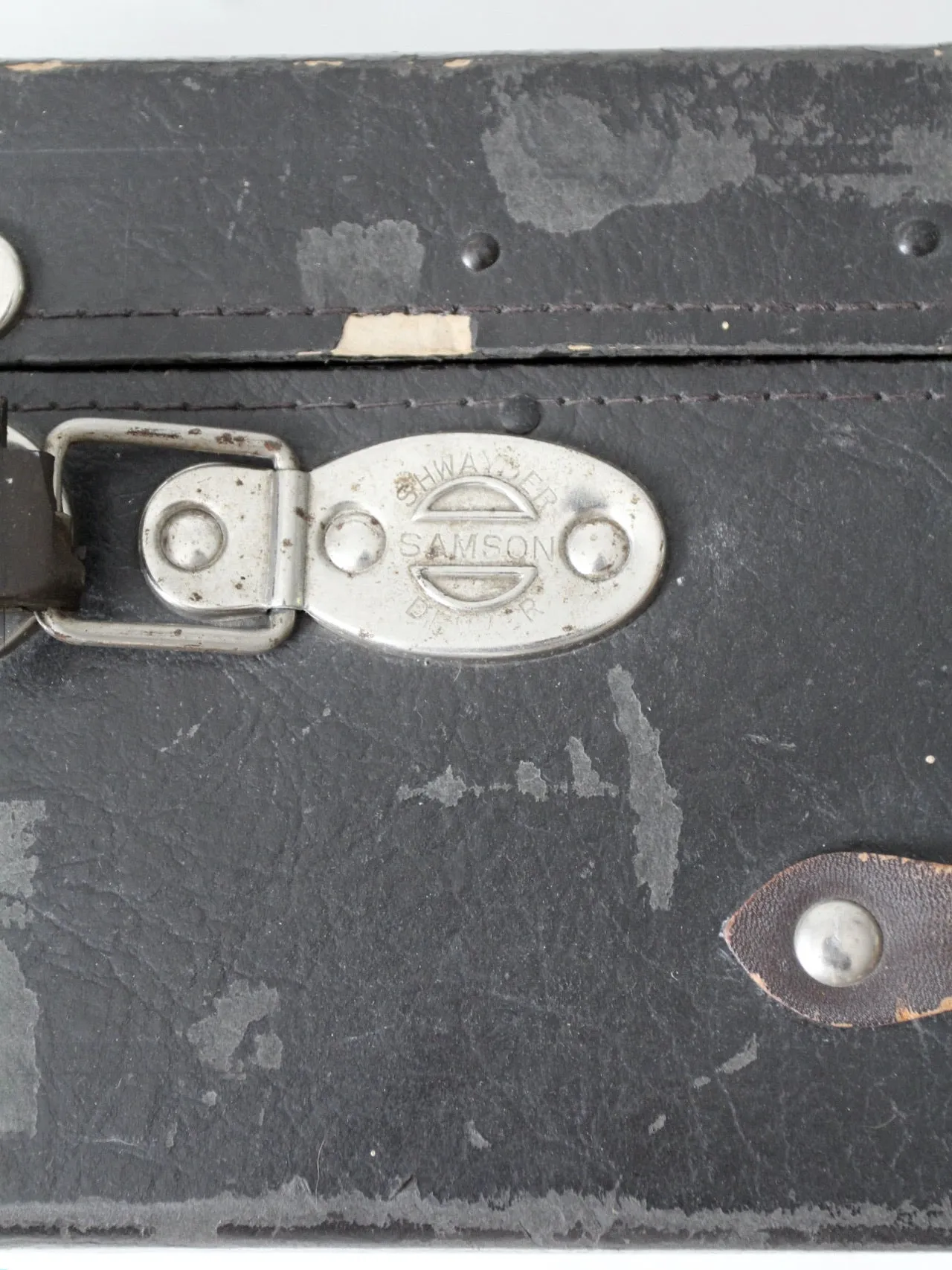 antique black suitcase