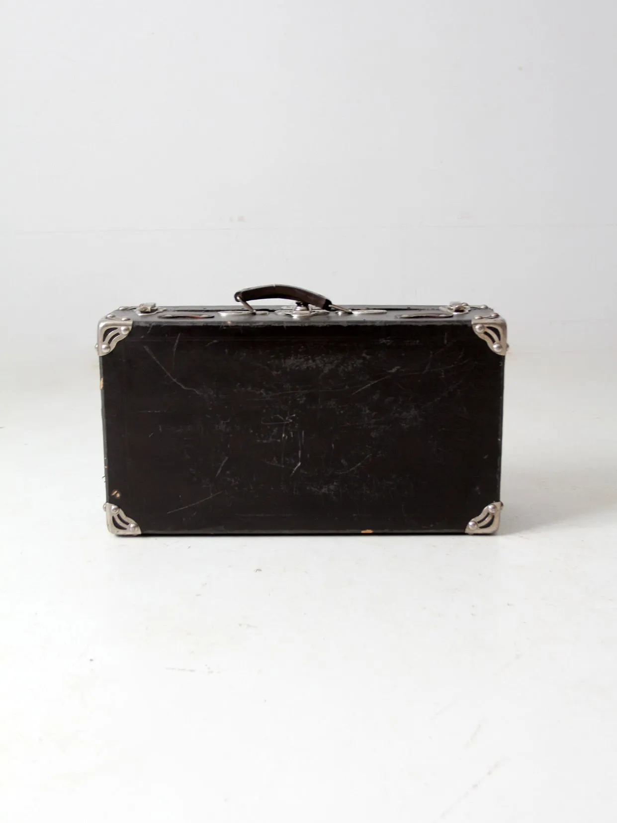 antique black suitcase