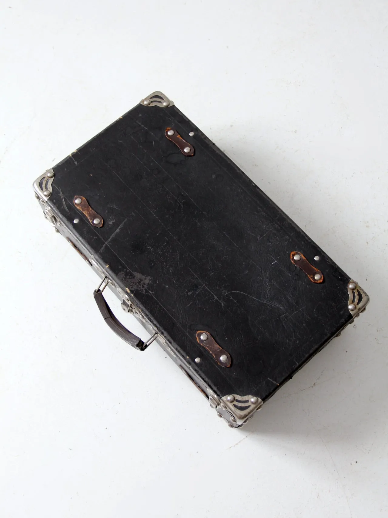 antique black suitcase