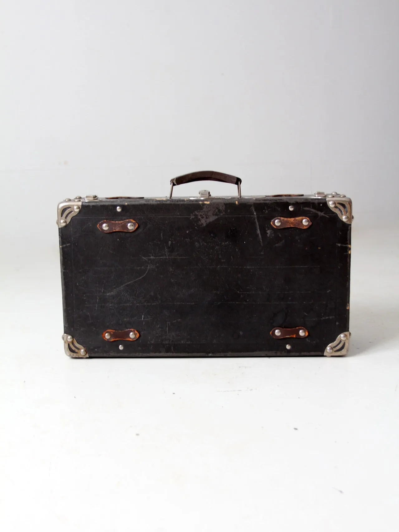 antique black suitcase