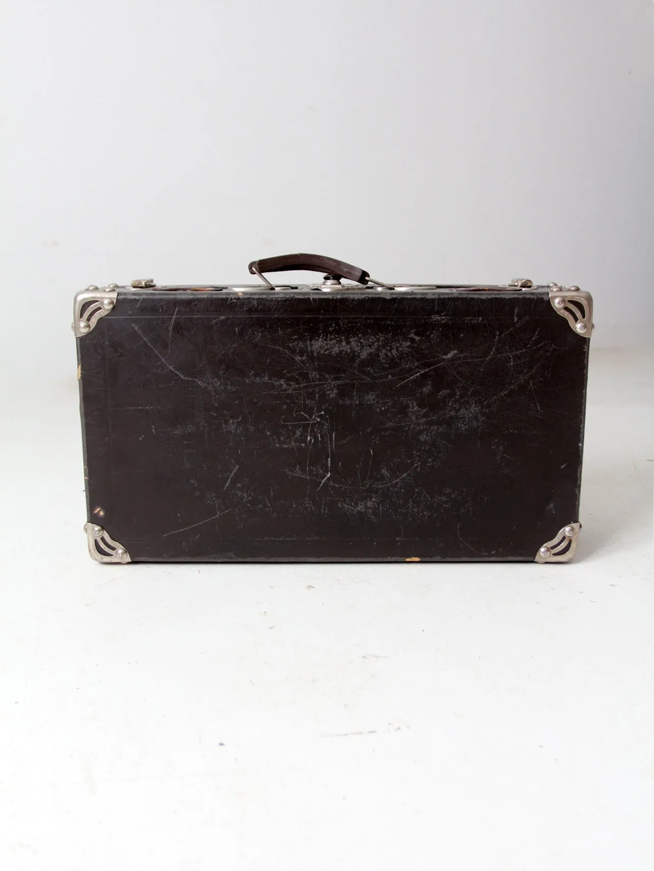 antique black suitcase