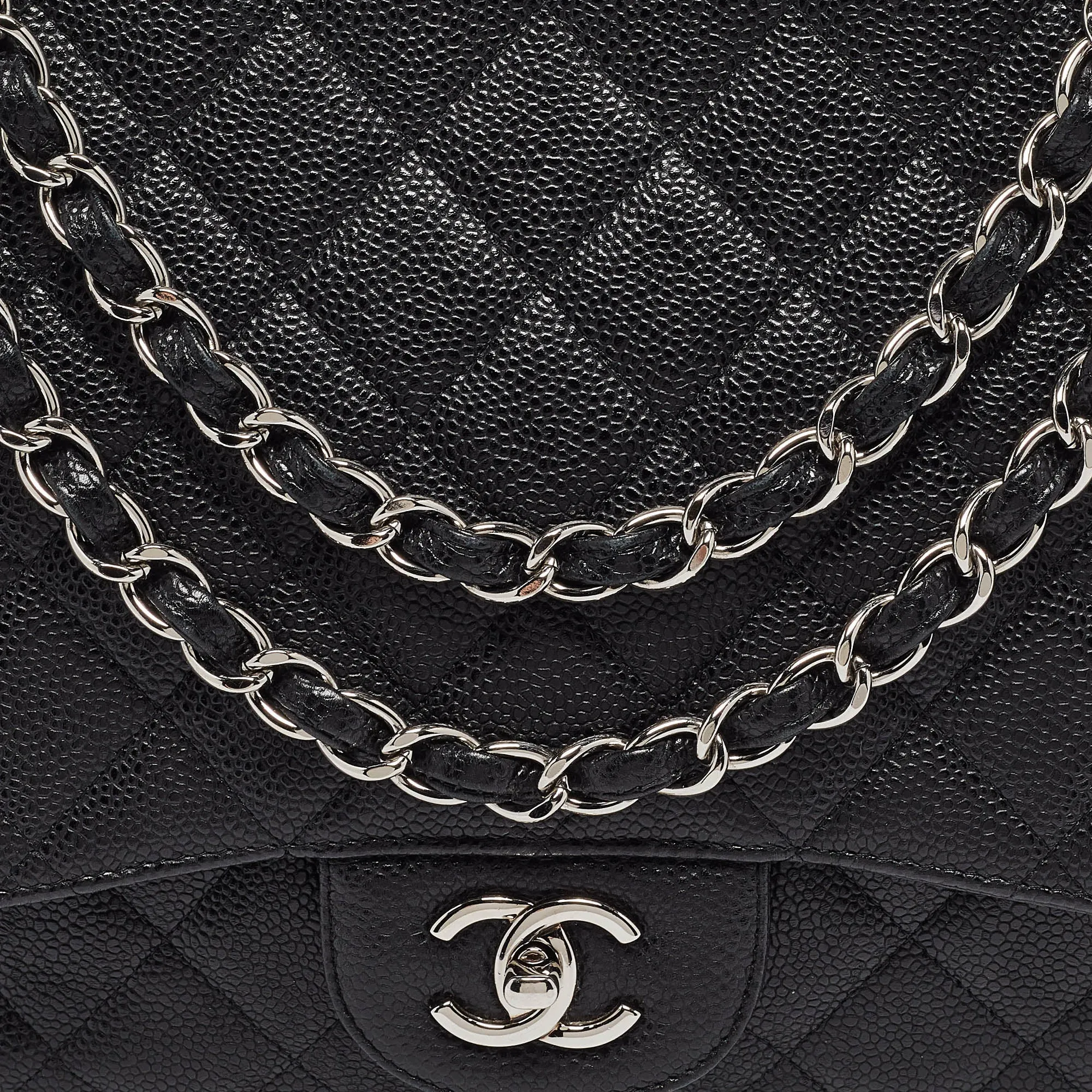 CHANEL Black Quilted Caviar Leather Maxi Classic Single Flap Bag