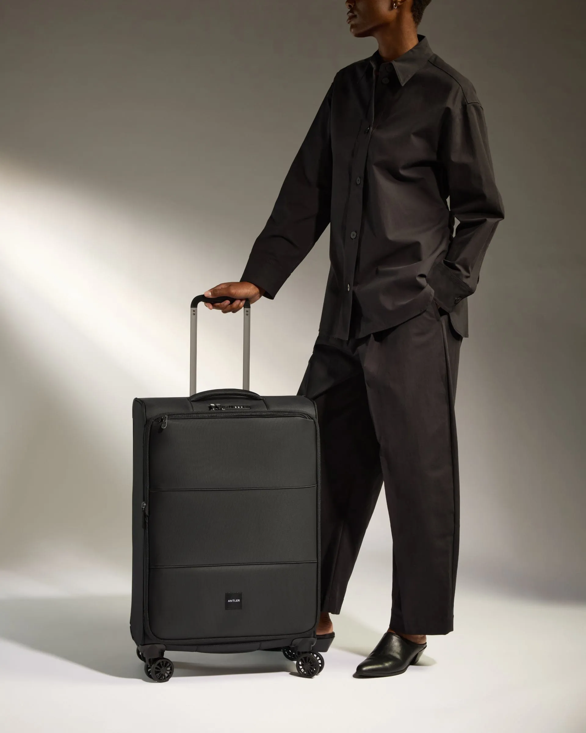 Lightest Medium Suitcase in Black - Soft Stripe